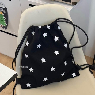 原创星星抽绳痛包小众黑色双肩包简约休闲学生可爱印花大容量背包