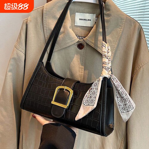 伊布古奇包包女2025新款真皮单肩腋下包高级感法棍包白色黑色休闲