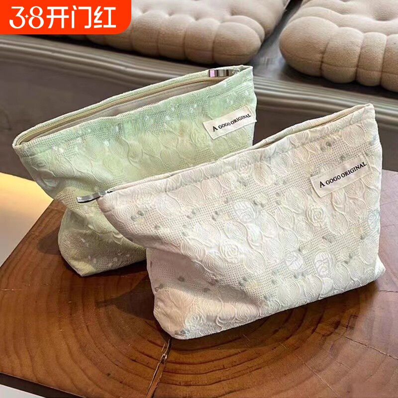 女生化妆包高级感ins便携高颜值化妆品收纳袋大容量手拿包新手工