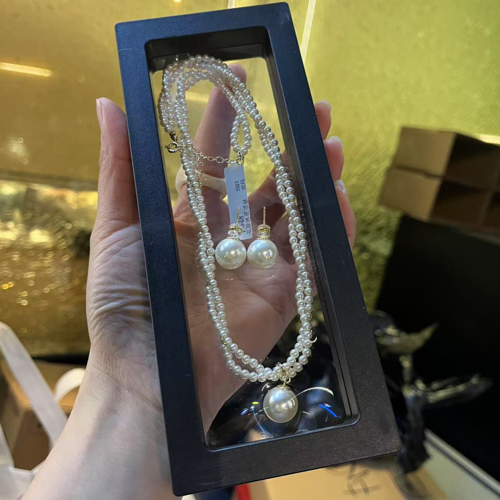 25年夏季新款时尚百搭精致扭绳麻花珍珠珠光爱心饰品项链+耳钉套