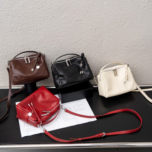 头层植鞣牛皮手提单肩小枕头包