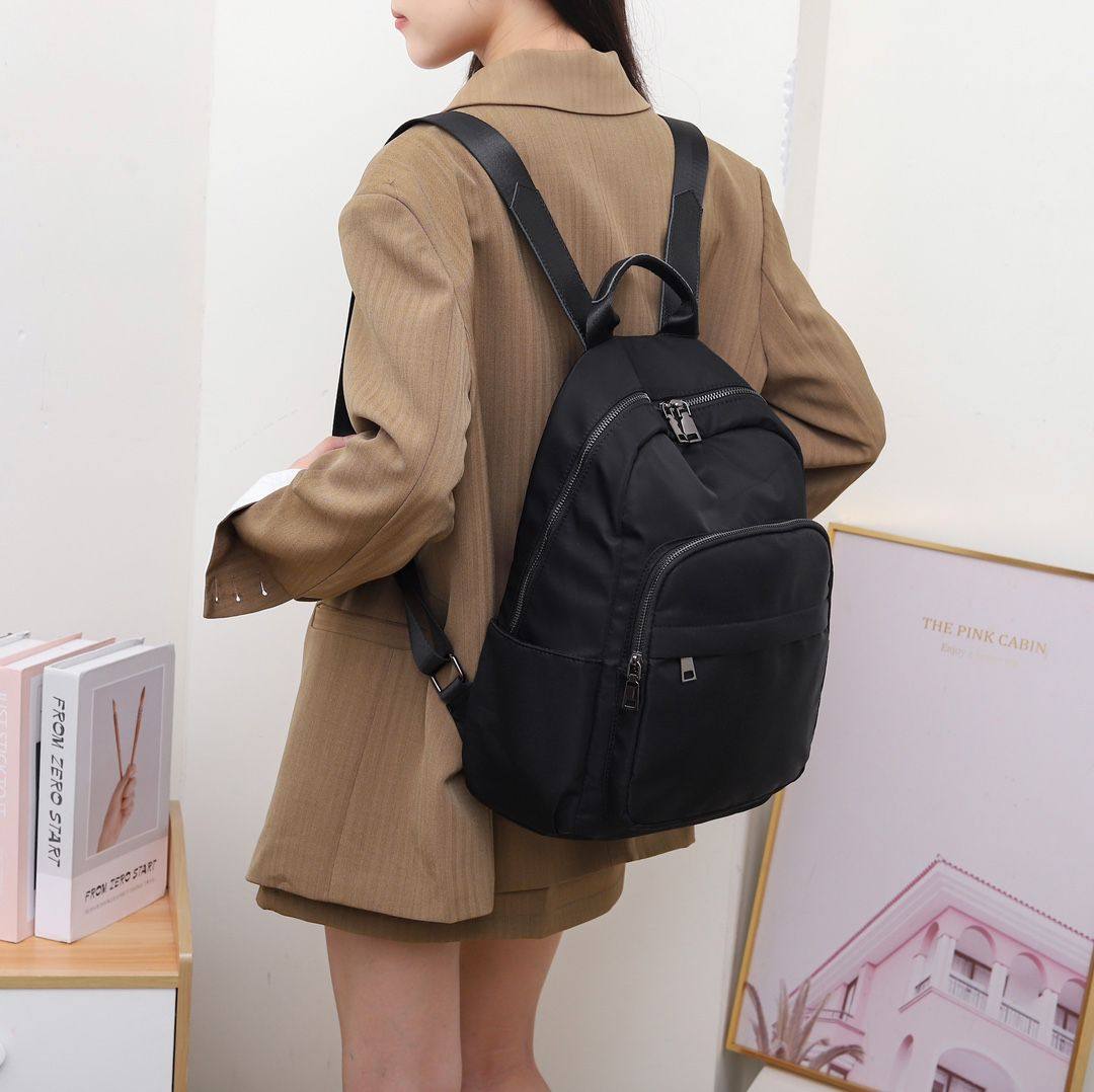 小众韩版百搭时尚背包实用轻便男女通用牛津布旅游双肩背包情侣包