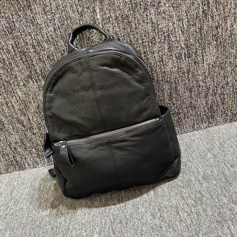 商场撤柜货手感好皮质软头层牛皮男女通用款旅游双肩背包纯皮包