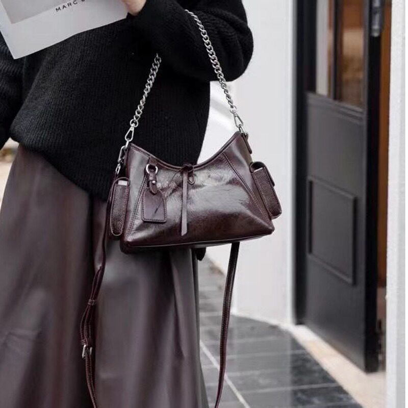 新品真皮女包韩版百搭时尚头层爆裂牛皮女手提单肩定型饺子包气质