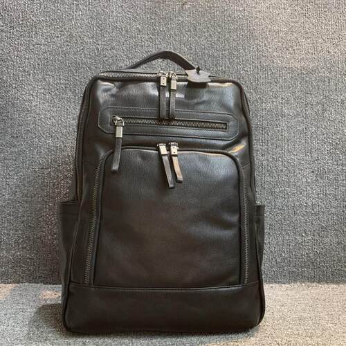 梦嘉丽男女通用双肩背包头层牛皮