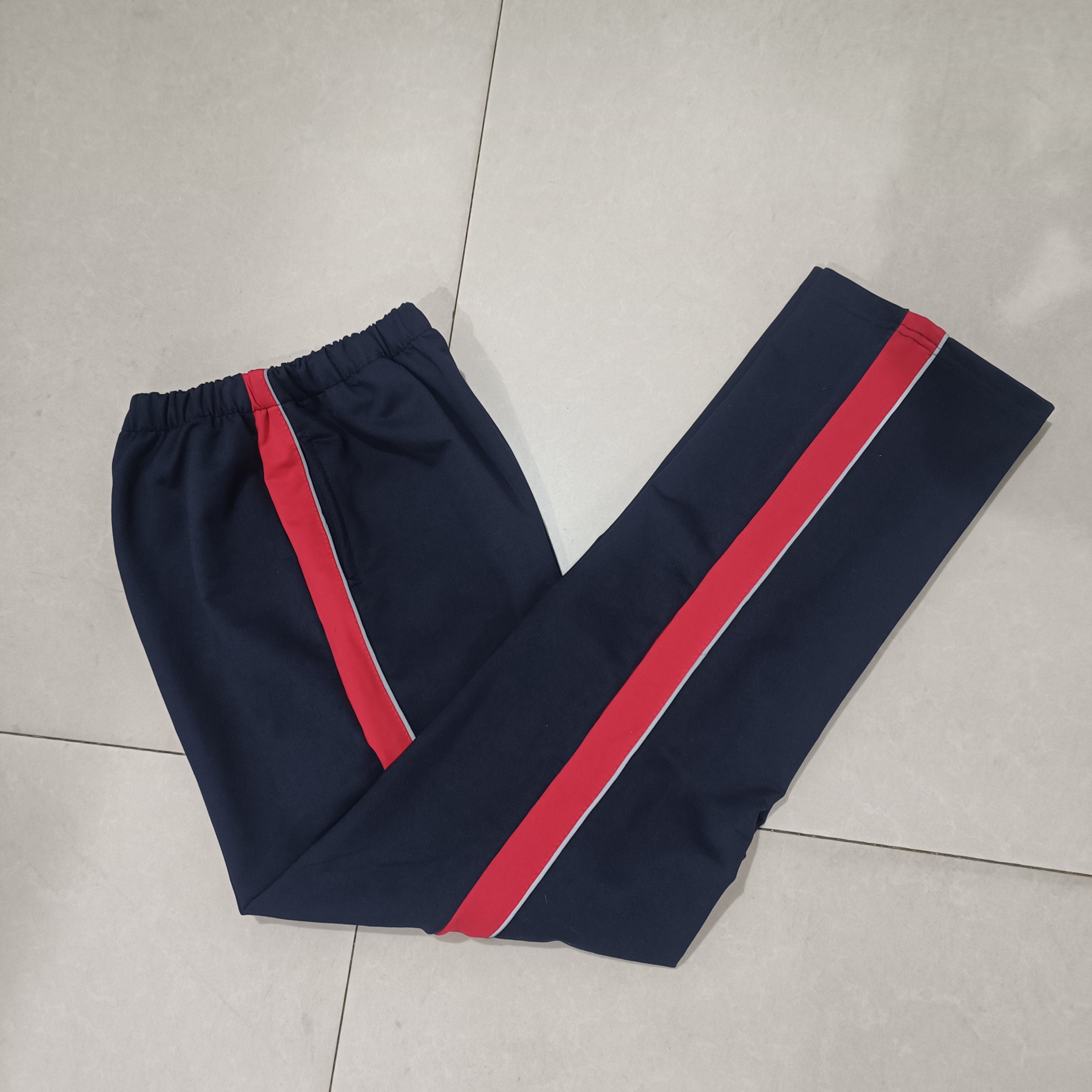 订做中小学纯棉校服裤子藏蓝拼大红宽杠前加反光细条休闲运动中性