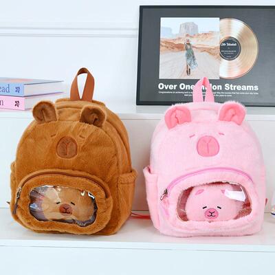 可爱丑萌水豚毛绒包卡通卡皮巴拉迷你双肩包儿童学生透明吧唧痛包