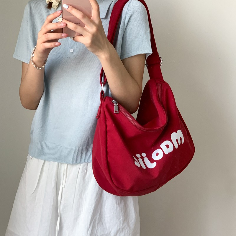 学院风字母帆布包包女2025新款潮时尚韩版托特包休闲大容量斜挎包