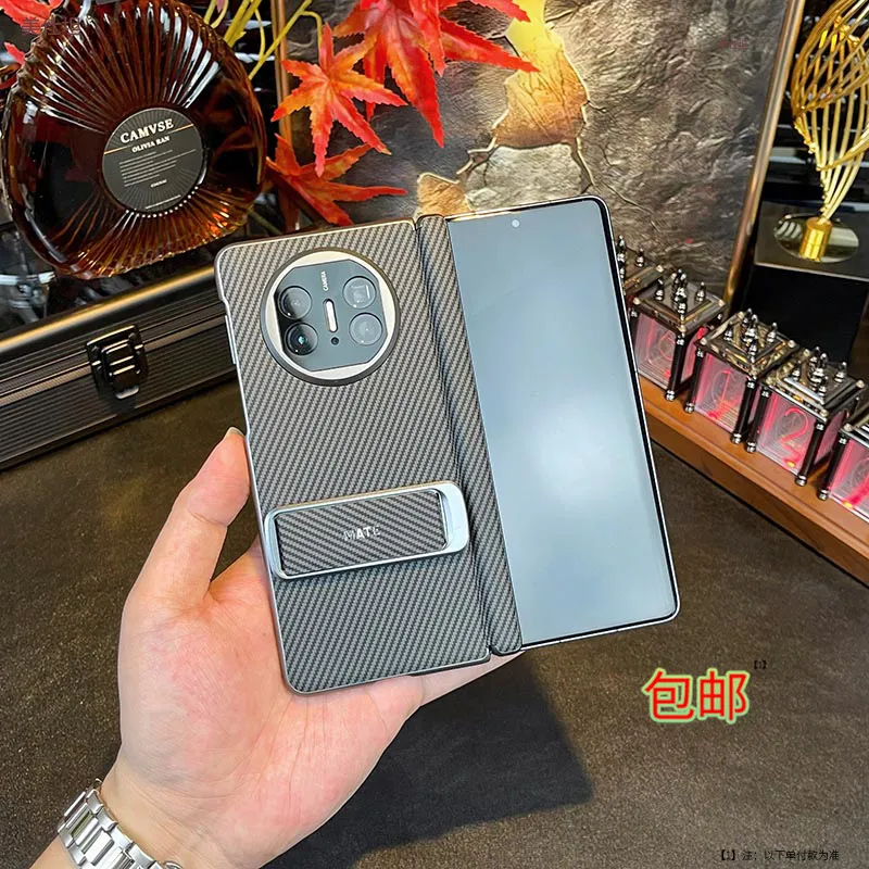 适用华为matex6典藏版手机壳新款碳纤维matex5支架腕带翻盖x3网红