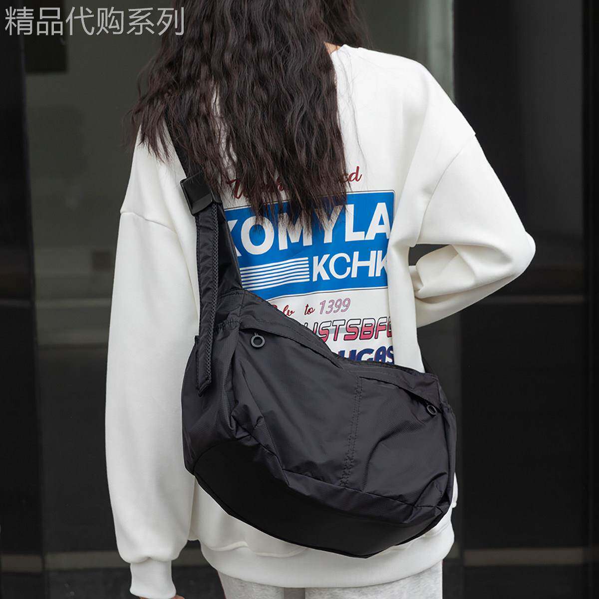 新加坡Cienda Kuelta 防水大容量包包女时尚潮简约宽带斜揹包夏季