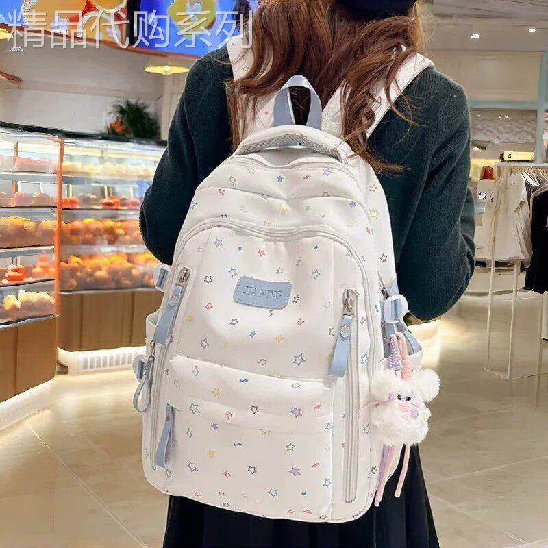 日本进口书包女生初中生高颜值轻便减负高中生大容量护脊双肩包女
