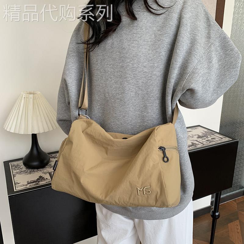 轻奢时尚尼龙布单肩包包女2025新款百搭出差大容量斜挎包男运动包