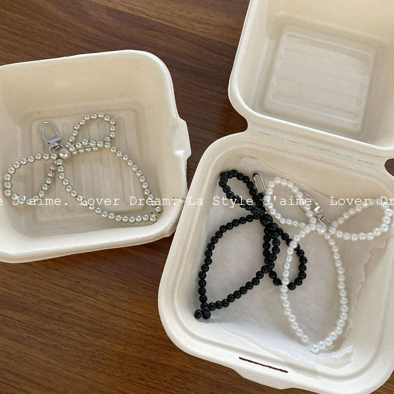 新款银色黑色串珠仿珍珠蝴蝶结包包挂件 时尚百搭钥匙扣挂件配饰