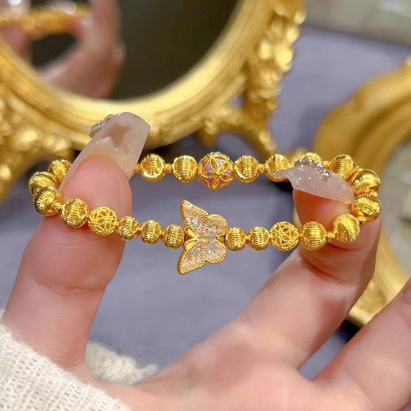 个性黄金色蝴蝶幻影珠手链爆闪猫眼转运珠轻奢高级感手串手饰新款