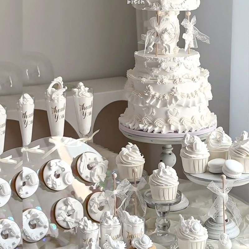 欧式纯白色浮雕婚礼甜品台