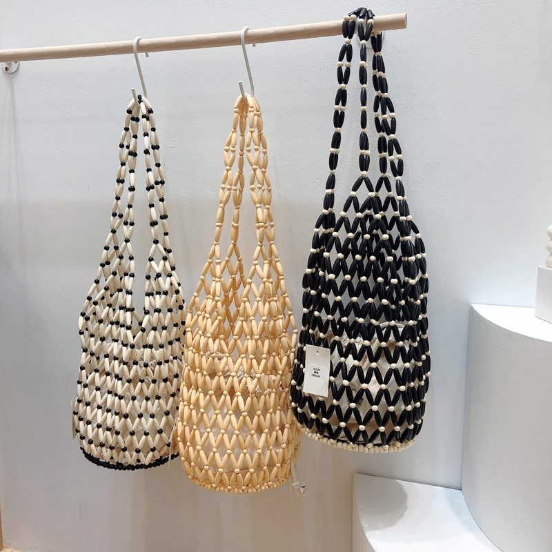 小众设计ins 复古木珠水桶包手工编织镂空包百搭单肩串珠手提包女