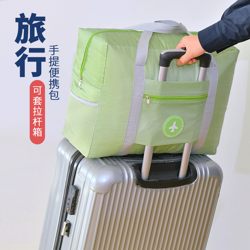 新款防水旅行收纳包手提登机包拉杆箱大容量可折叠牛津布行李包