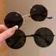 17#Черные солнцезащитные очки объединили две наряды