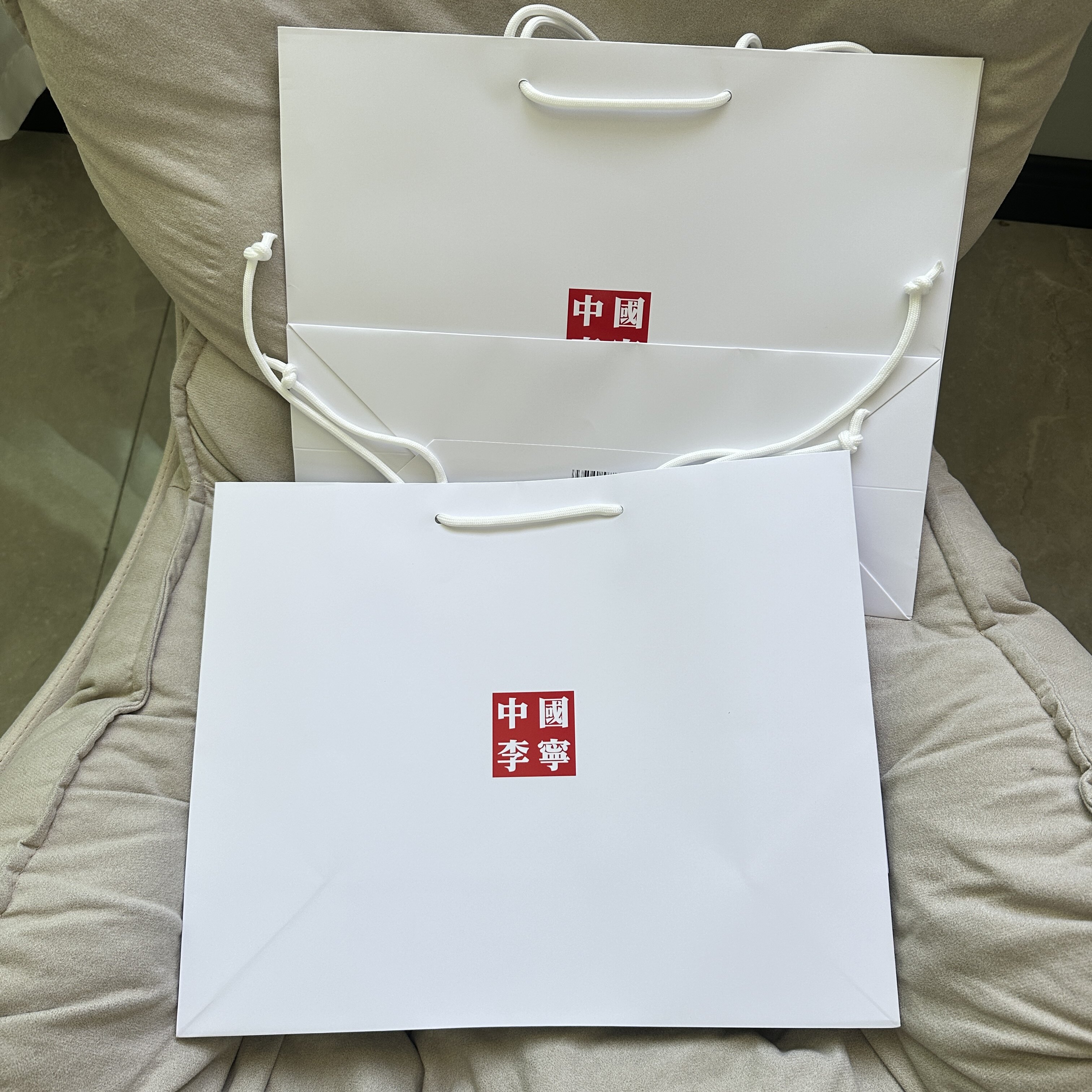 中国李宁专柜正品手提纸袋 红色鞋盒服装购物袋 羽绒服包装礼袋