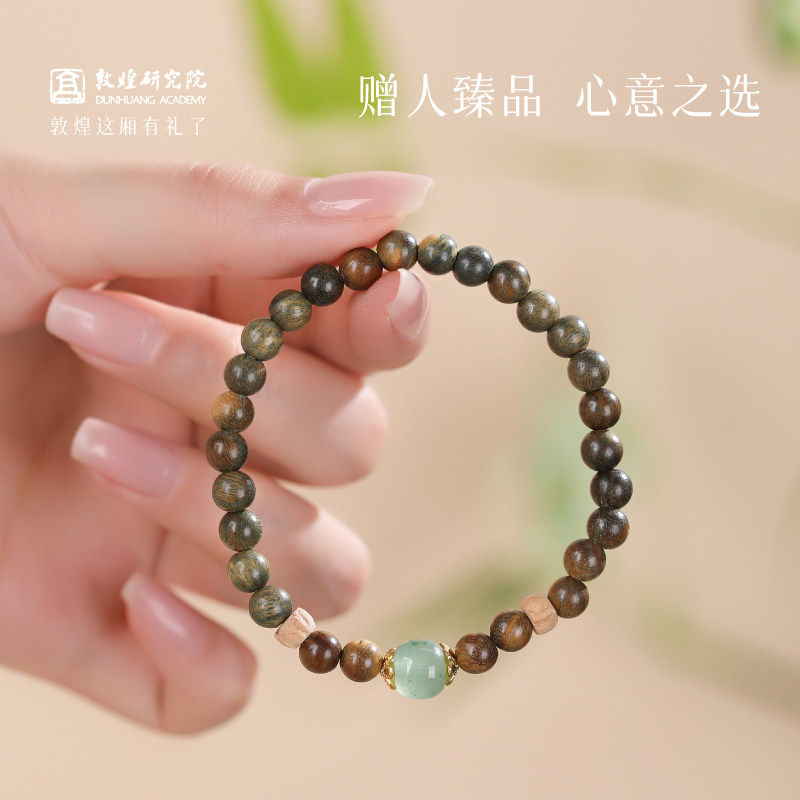 绿檀木百香籽核桃单圈手串图片