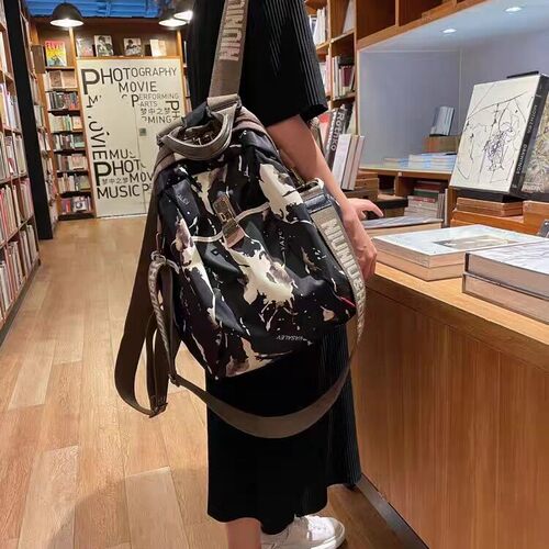 水墨千金旅行双肩包女2026新款时尚女士背包休闲防水牛津布旅游包