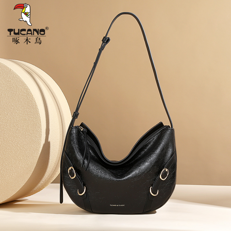 啄木鸟包包女2025新款月牙形腋下包高级植鞣质感水桶包单肩斜挎包