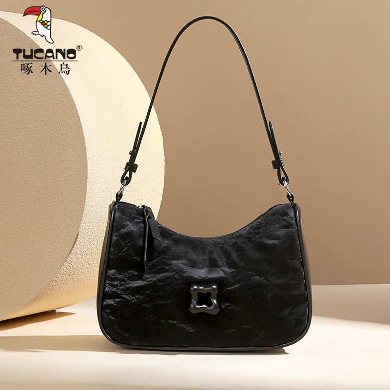 啄木鸟包包女式2025新款月牙形腋下包高级感废土风小众斜挎单肩包