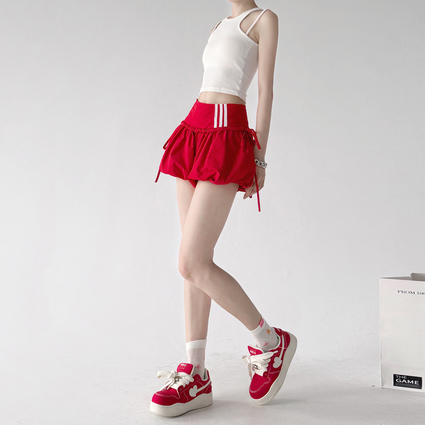 巨好看红色高腰花苞半身裙女2026夏天新款A字绑带短裙显瘦蓬蓬裙