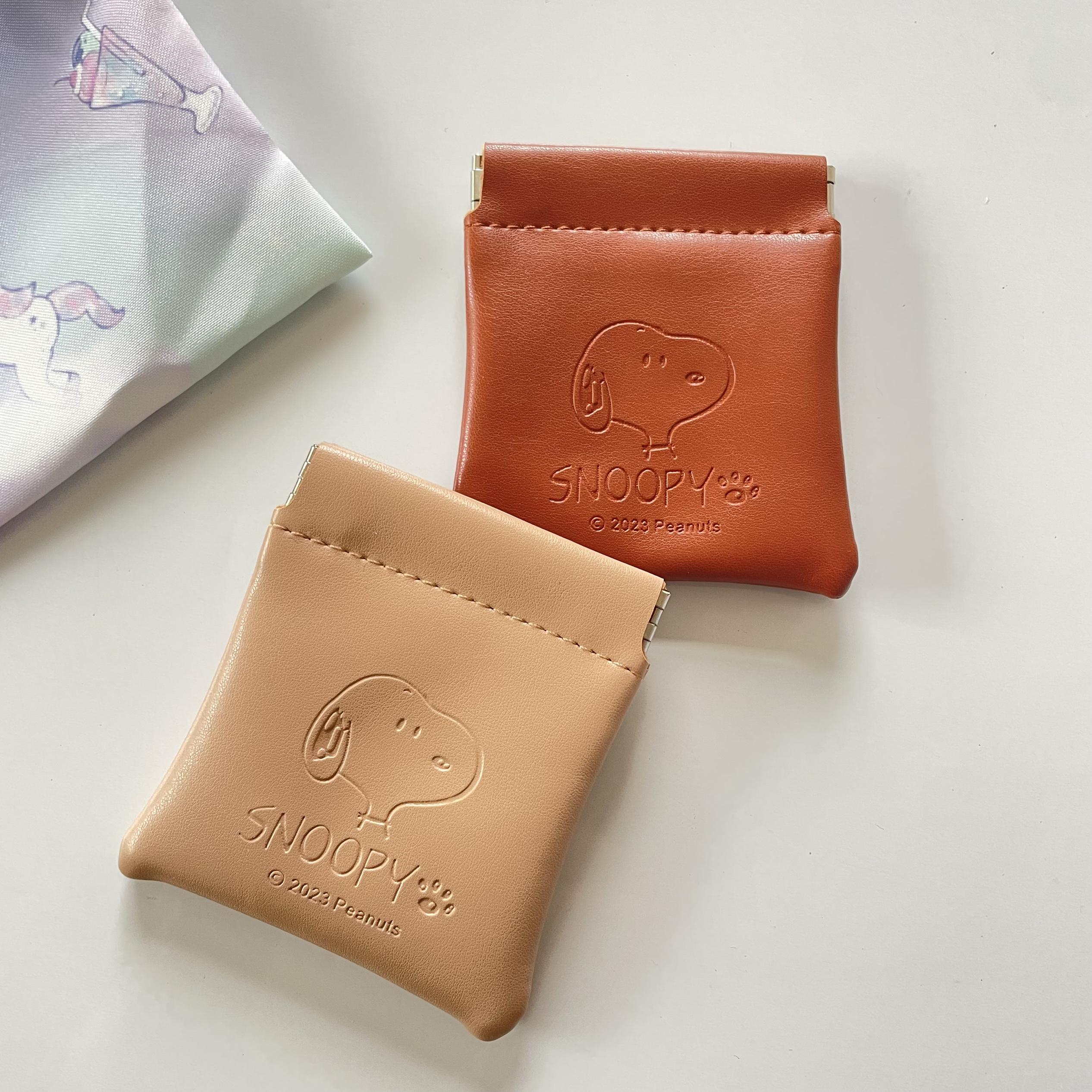 可爱卡通棕色狗狗PU手拿化妆包金属弹片按压开口零钱口红收纳包