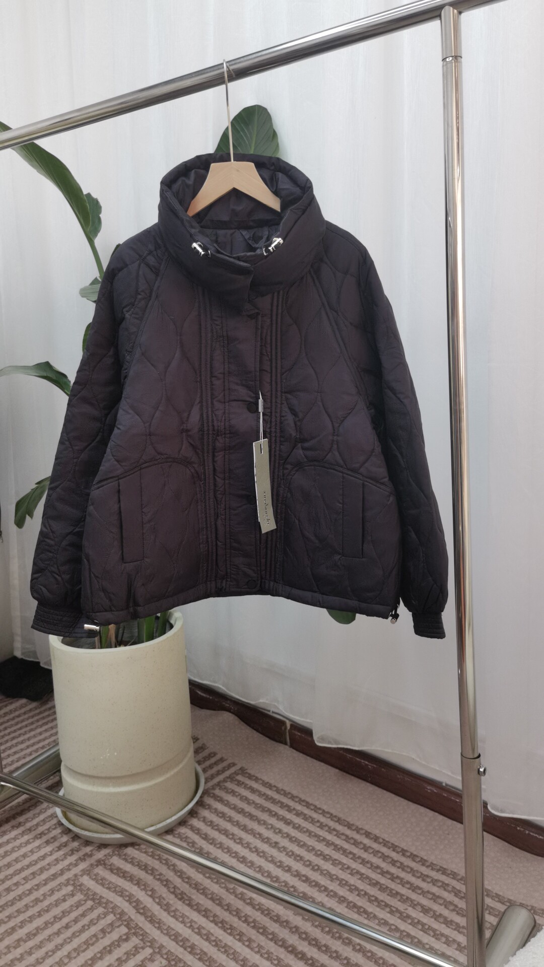 雪丹枝撤柜羽绒服
