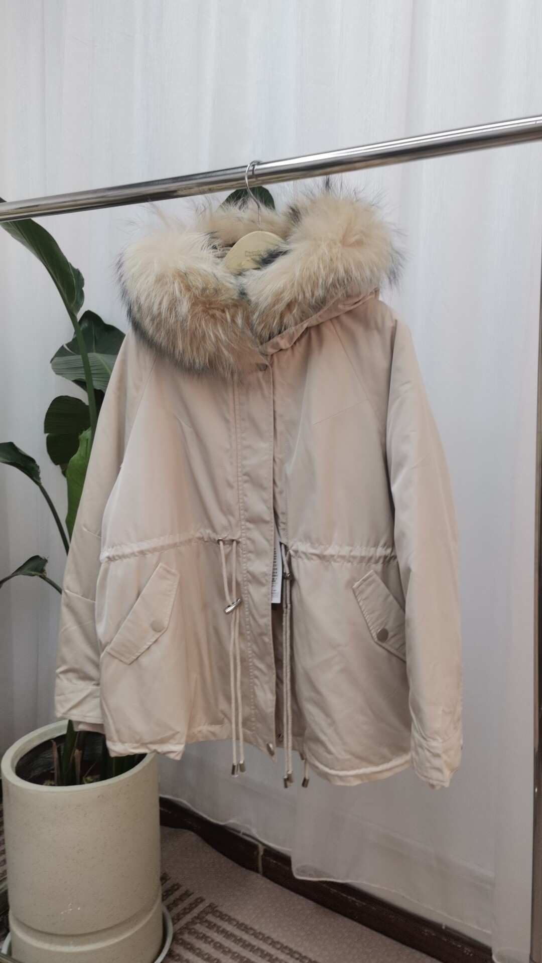 雪丹枝撤柜派克羽绒服