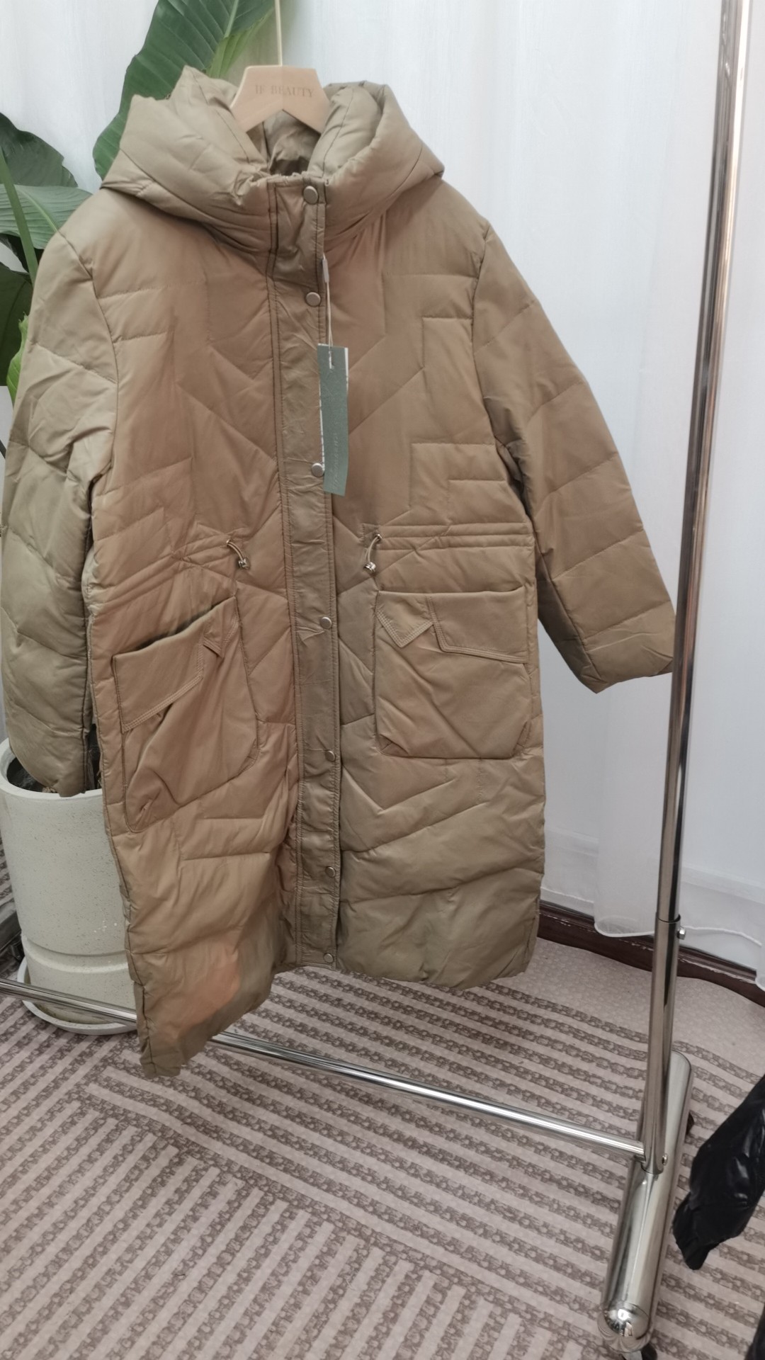 雪丹枝撤柜长款羽绒服