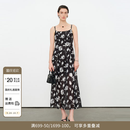 黑白花吊带连衣裙