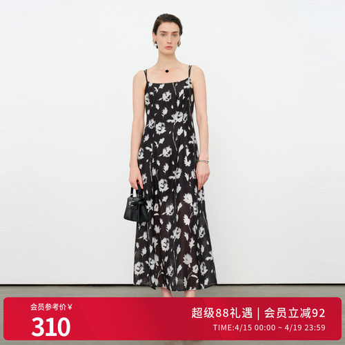 黑白花吊带连衣裙