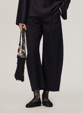 【AETNA PROJECT】hug 2025早春新款黑色棉质月牙九分裤