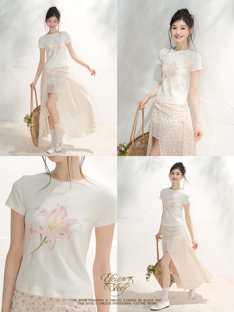 Model wearing a white floral graphic T-shirt with a pink floral wrap skirt set