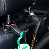 Троллейная тележка с крючком в автомобиле с скрытыми скрытыми невидимыми творческими продуктами интерьера хранилища в автомобиле