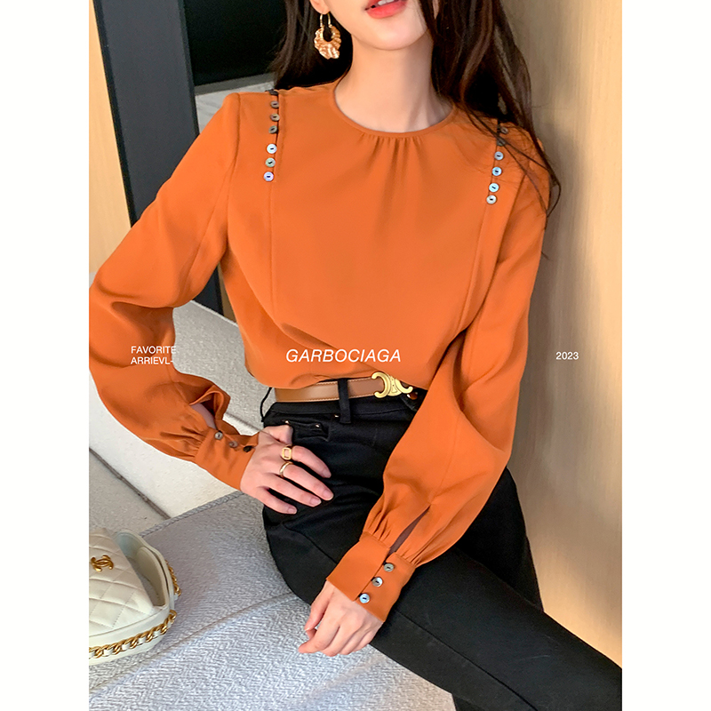 龍喜儿宽松通勤26颗真贝母扣衬衫