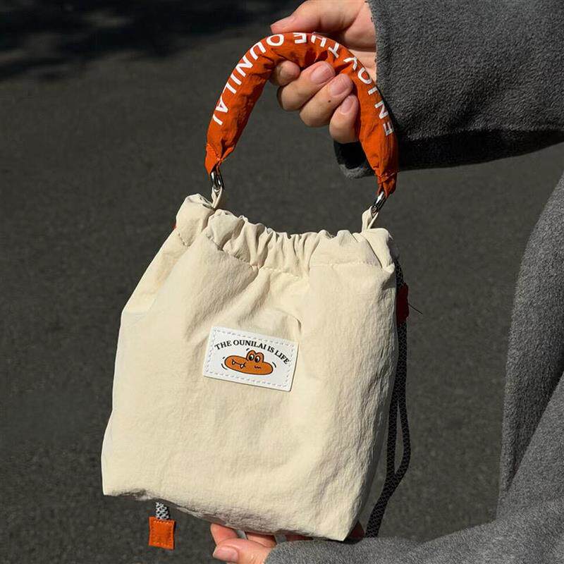 适用富士索尼佳能r50微单相机包拍立得女斜挎便携出游手提摄影包