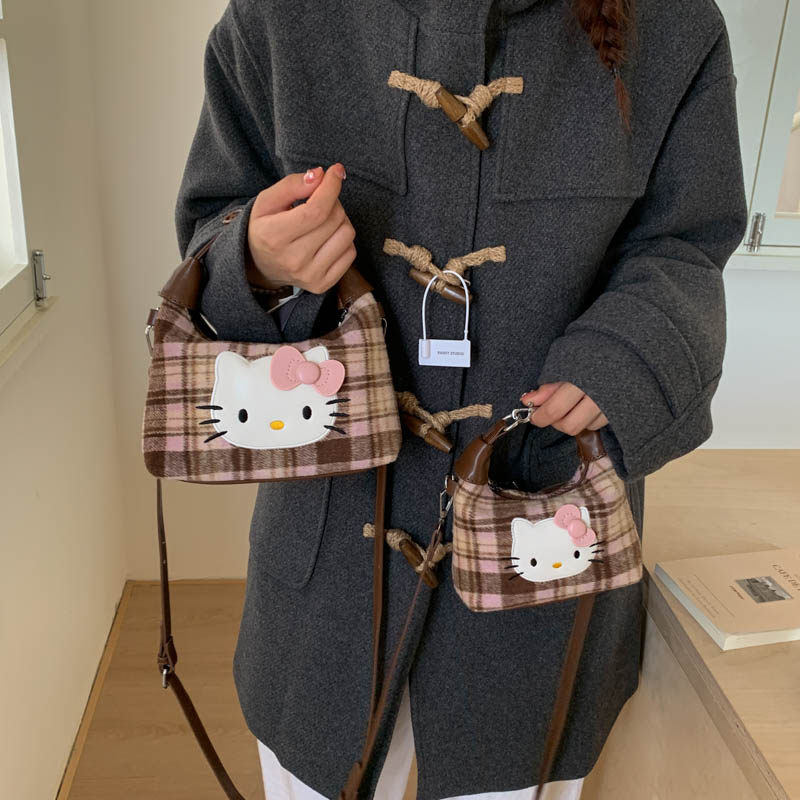 可爱手提小包包女2025新款秋冬超火精致单肩包百搭小众设计斜挎包