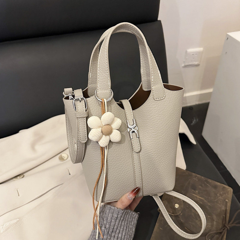 高级感轻奢小众手提包2026新款春夏时尚子母单肩水桶包通勤斜挎包