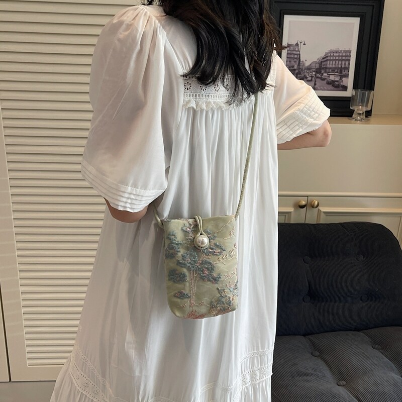 .手机专用小挎包女士2025夏季新款散步斜跨收纳包小巧轻便迷你挂