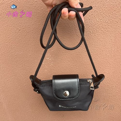新款修丽可黑色迷你饺子可爱包包斜挎休闲单肩小化妆包