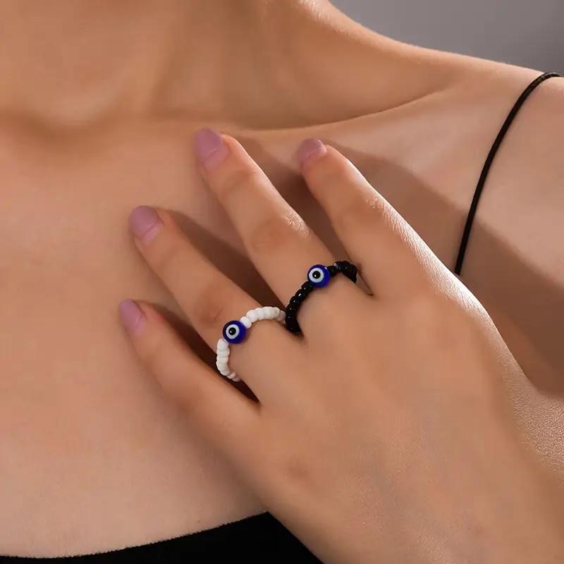 Eye-shaped elastic rice bead ring gift for students个性指环