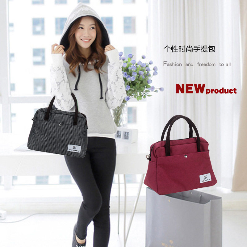 防水简约女式手提包韩版小包包条纹布包时尚饭盒包便当手拎袋广州