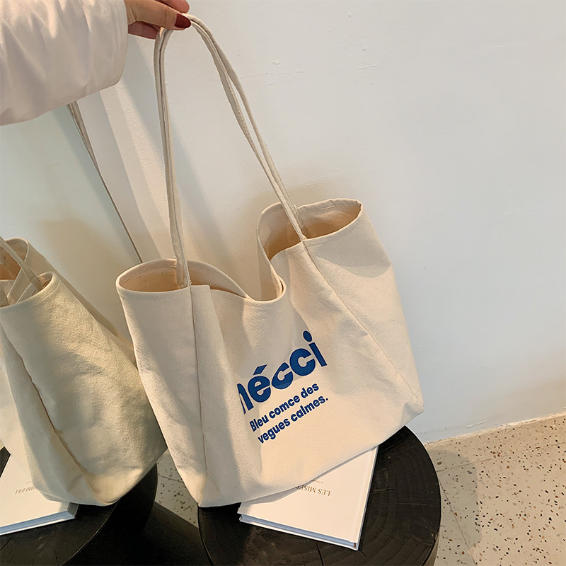 极简帆布包包女春夏2025新款字母印花手提包大容量布袋休闲单肩包