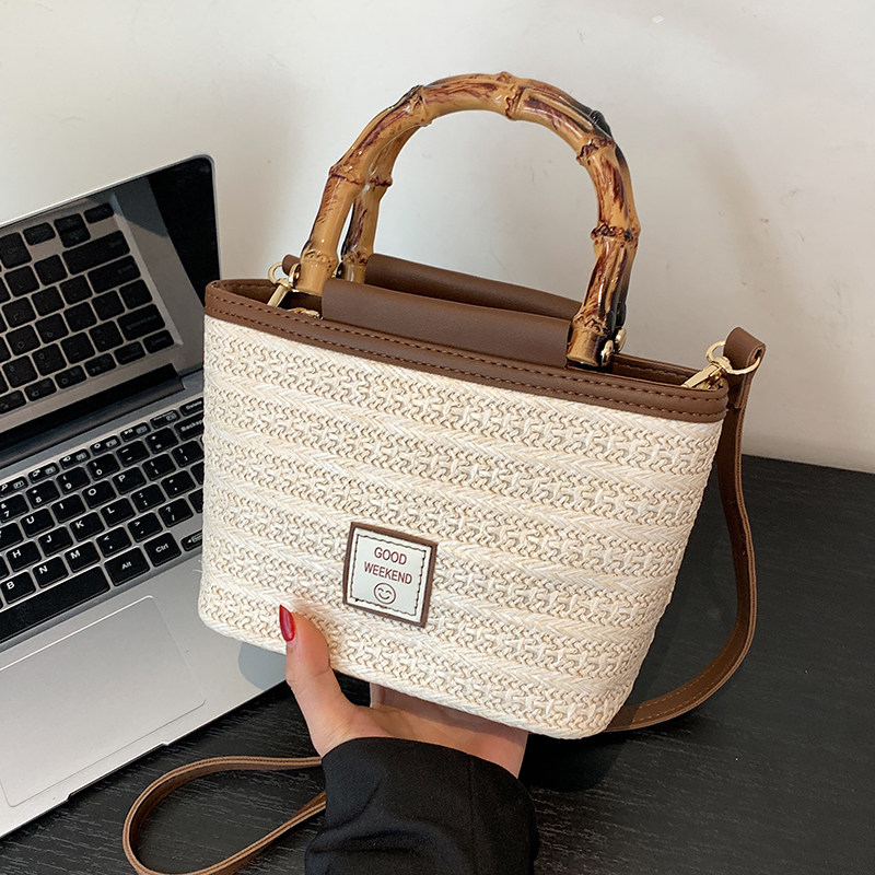 复古时尚手提包包女2025新款春夏简约休闲水桶包高级感小众单肩包,箱包皮具/热销女包/男包,水桶包,淘宝优惠券,粉丝福利购,淘宝优惠卷