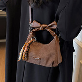 韩国新款 ins小众设计蝴蝶结饺子包2025女时尚 潮女简约百搭单肩包