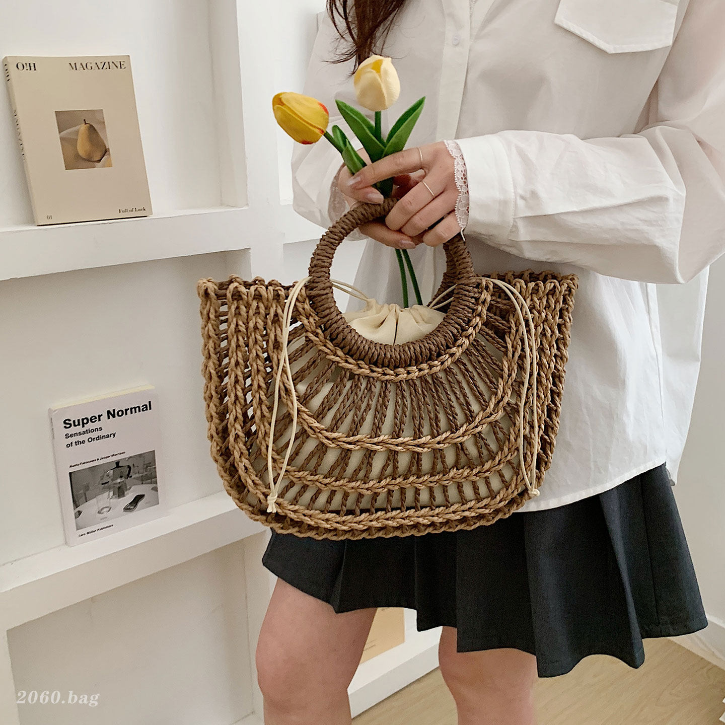 度假风手工针织包手提包女2026新款镂空半圆包编织休闲时尚大包