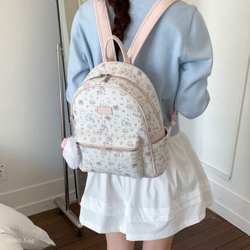 甜美印花双肩包女2026夏季新款学生通勤时尚大容量轻便百搭背包